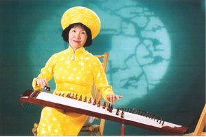 Music Professor Nguyen Vinh Bao in the south playing the zither